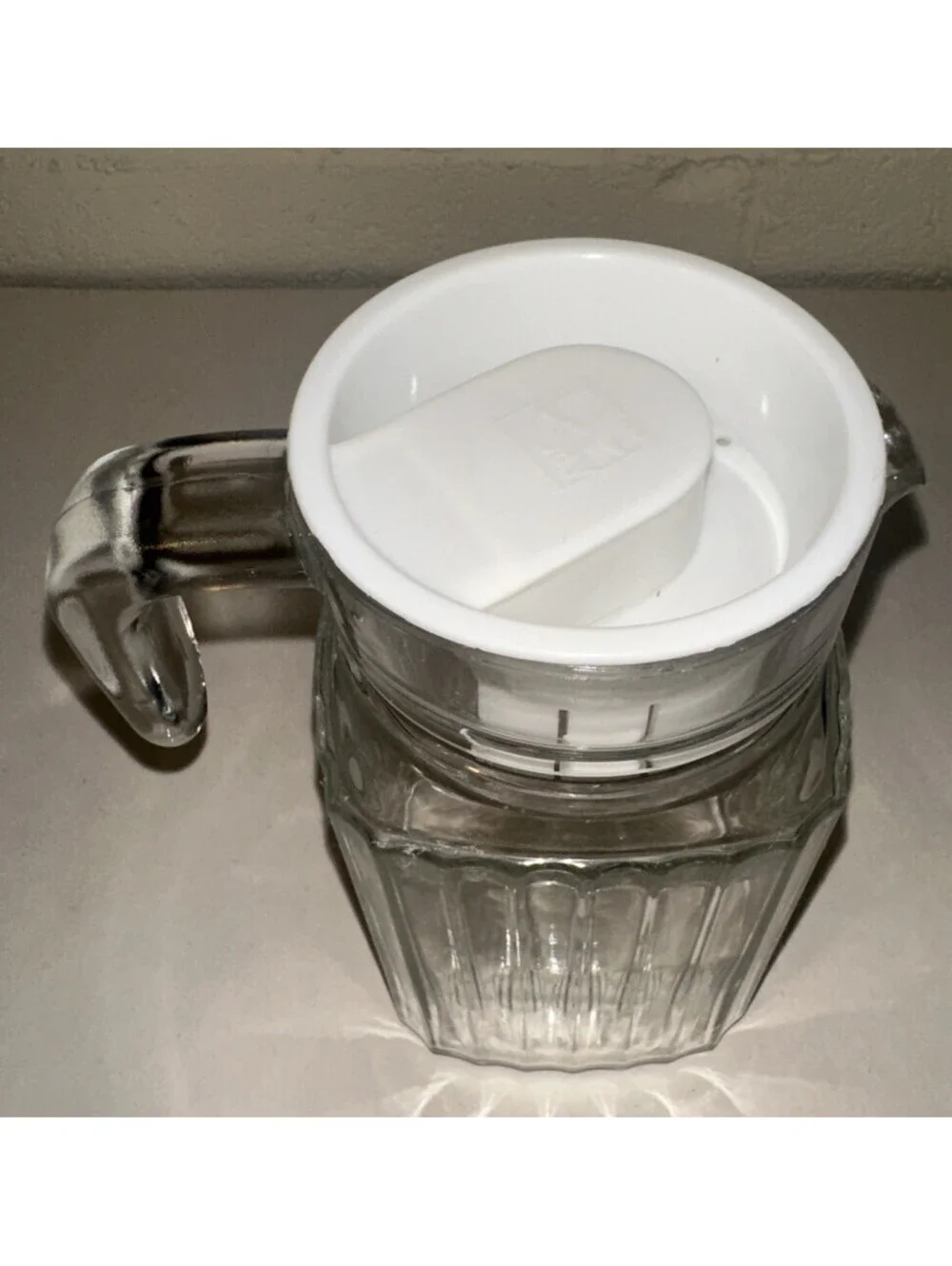 Vintage ARC Glass Small 16 oz Ribbed Pitcher With White Lid